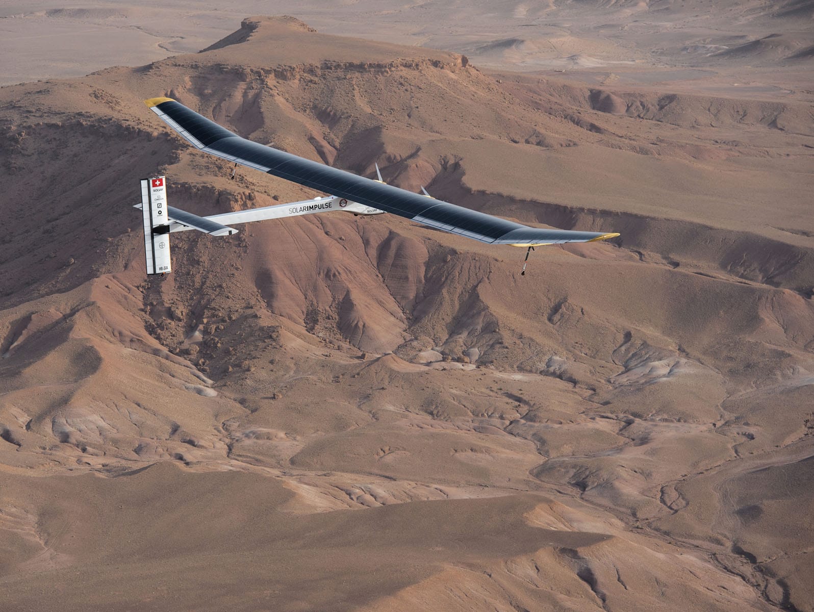 The Solar impulse aircraft, in the Moroccan desert sky